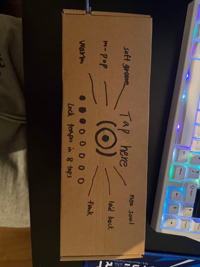 TapTempo hand-drawn interaction prompt on cardboard
