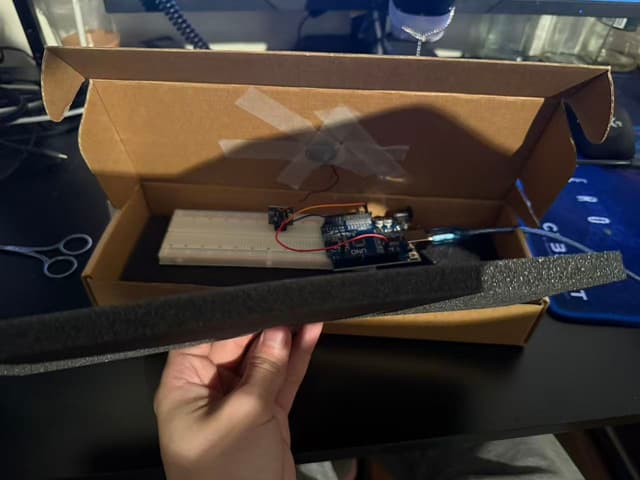 TapTempo cardboard prototype with Arduino mounted inside